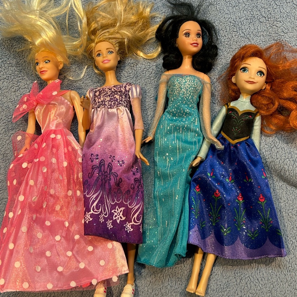 Fashionable Doll Set with Pink, Purple, Teal, and Blue Dresses